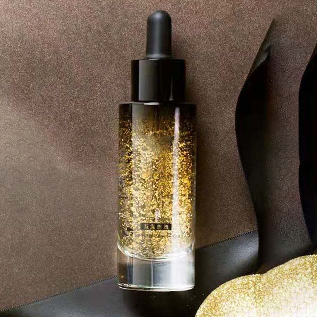 Fancy Label 30ml Push Button Pump Cosmetic Dropper Packaging Bottle Black Thick Cylinder Glass Round Essential Oil Glass Bottle