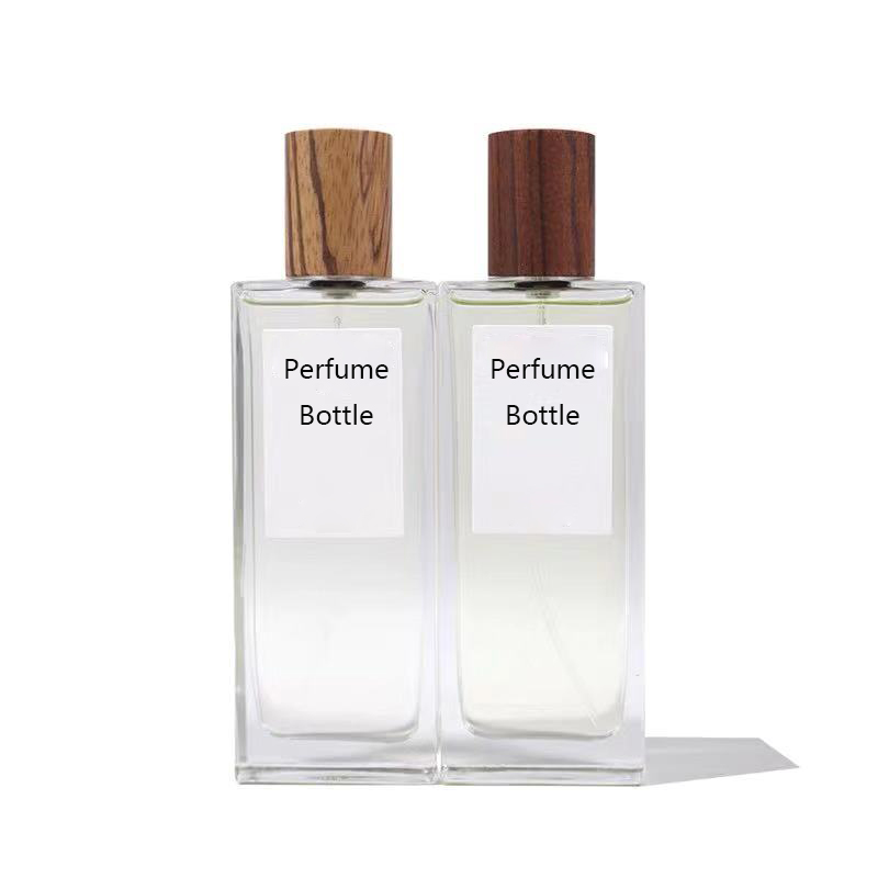 Fancy atomizer golden arabia auto empty 50ml glass perfume bottle with wooden cap