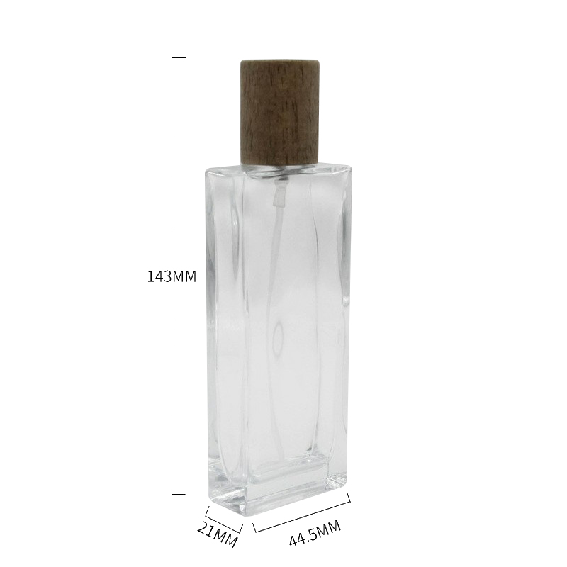 Fancy atomizer golden arabia auto empty 50ml glass perfume bottle with wooden cap