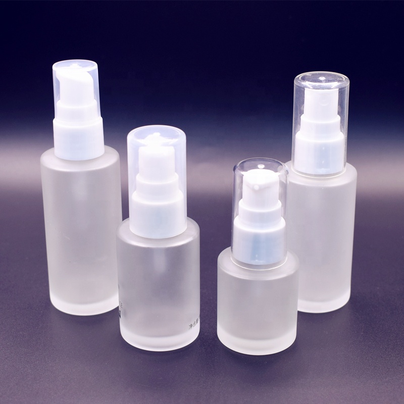 Fancy empty Round Flat shoulder 20ml 30ml 40ml 50ml 60ml 100ml frosted lotion bottles with white spray and pump top