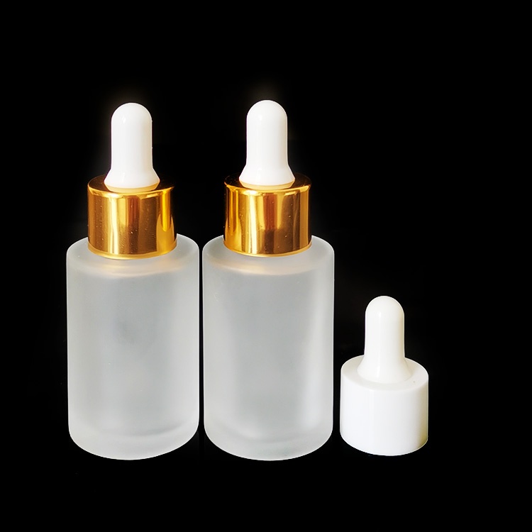 Fancy essential oil bottle frosted 30 ml serum glass bottle luxury glass dropper bottle with packaging tube