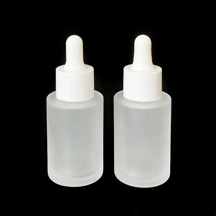 Fancy essential oil bottle frosted 30 ml serum glass bottle luxury glass dropper bottle with packaging tube