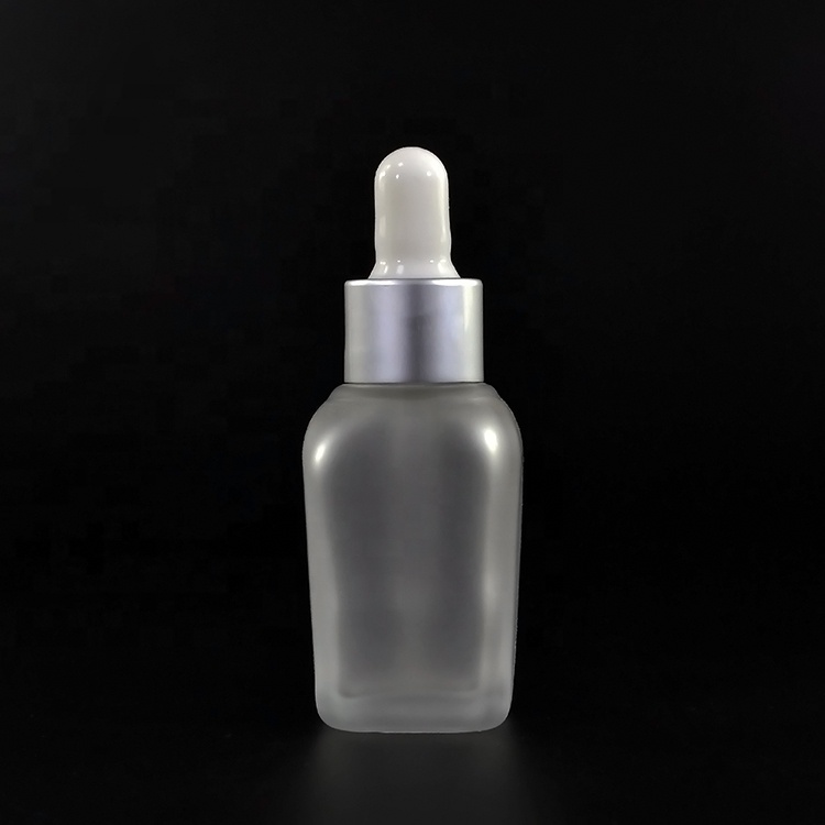 Fancy square 15ml 20ml 30ml 50ml 100ml 30 ml clear frosted clear perfume glass dropper bottle with gold hollow caps