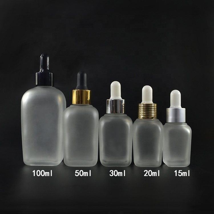 Fancy square 15ml 20ml 30ml 50ml 100ml 30 ml clear frosted clear perfume glass dropper bottle with gold hollow caps