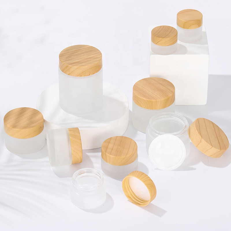 Fashion Packaging 50G Cosmetic Jar Frosted Glass Bottle Clear Cosmetic Glass Bottle Plastic Lid with Wood Graphics