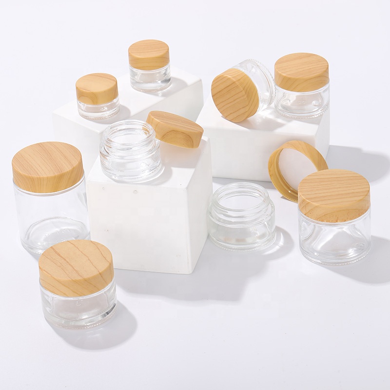 Fashion Packaging 50G Cosmetic Jar Frosted Glass Bottle Clear Cosmetic Glass Bottle Plastic Lid with Wood Graphics