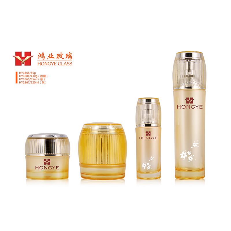 Fashion Packaging transparent golden color empty cosmetic sets spray glass bottle with pump HY1865