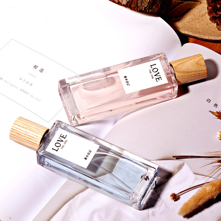 Fashion wooden lids empty perfume bottles 50 ml glass spray for perfume oil bottles 100ml