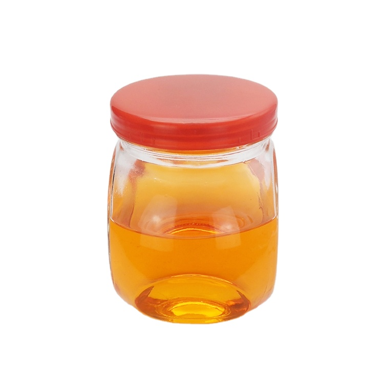 Flat drum shape clear 680ml wide mouth glass storage jar with plastic cap