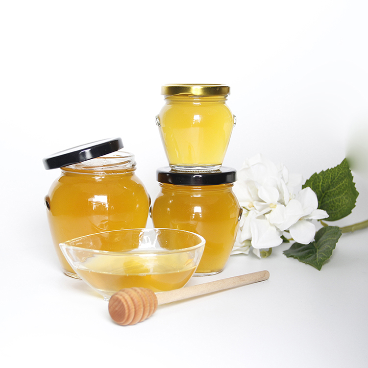 Flint empty round glass orcio honey packaging jars with gold lid