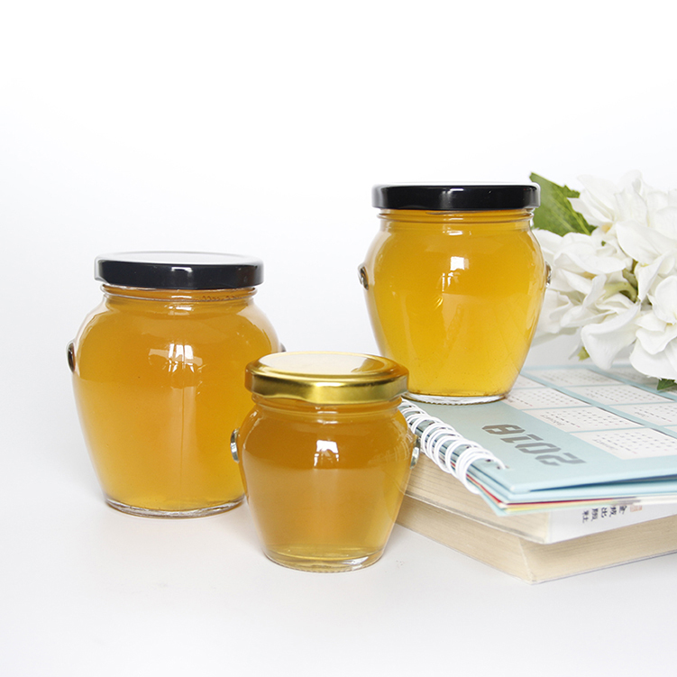 Flint empty round glass orcio honey packaging jars with gold lid