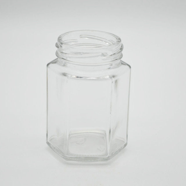 Flint hexagon shaped honey jam jar glass wholesale 100ml