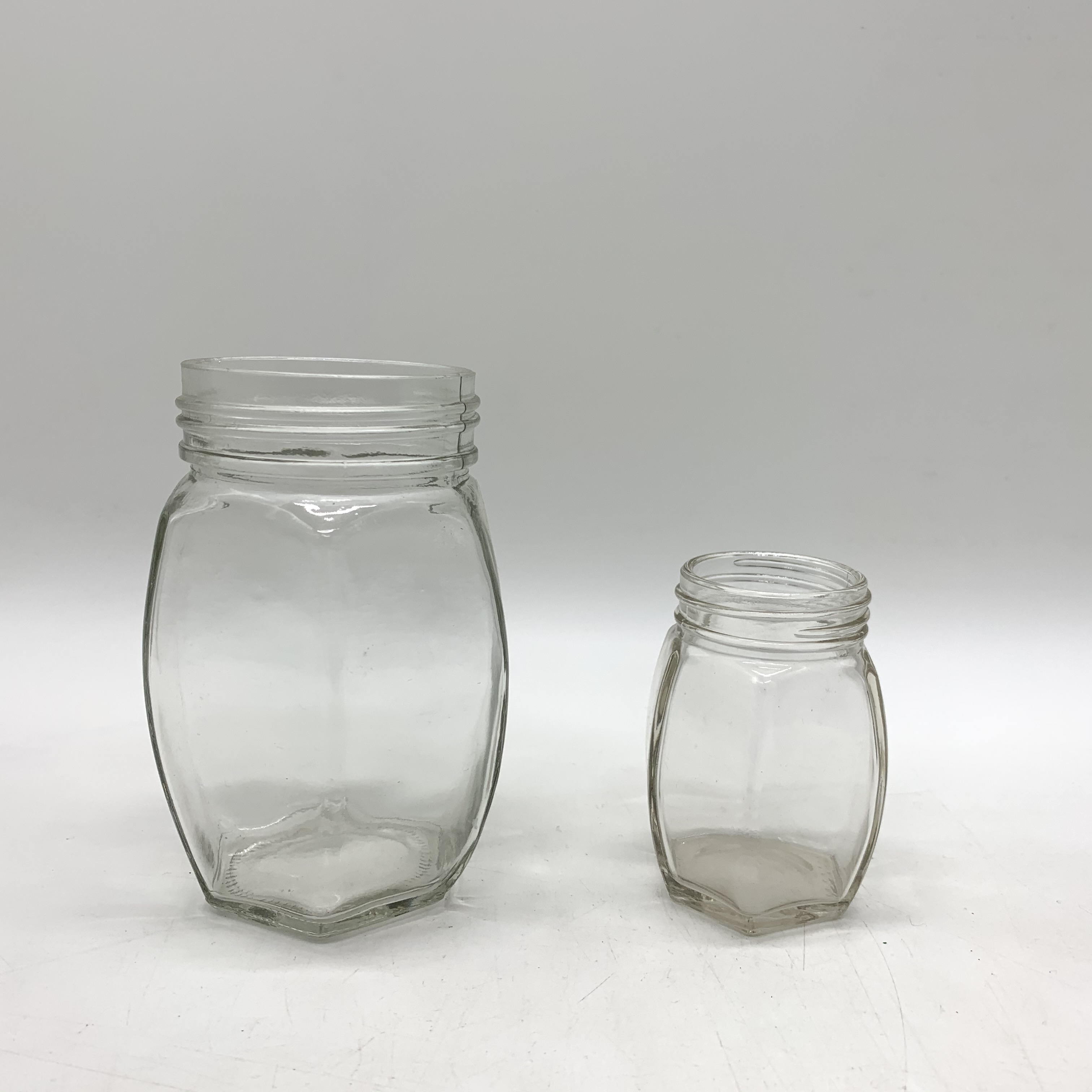 Food Grade 350ml 500ml Oval Hexagon Glass Jar For Honey Jam Food