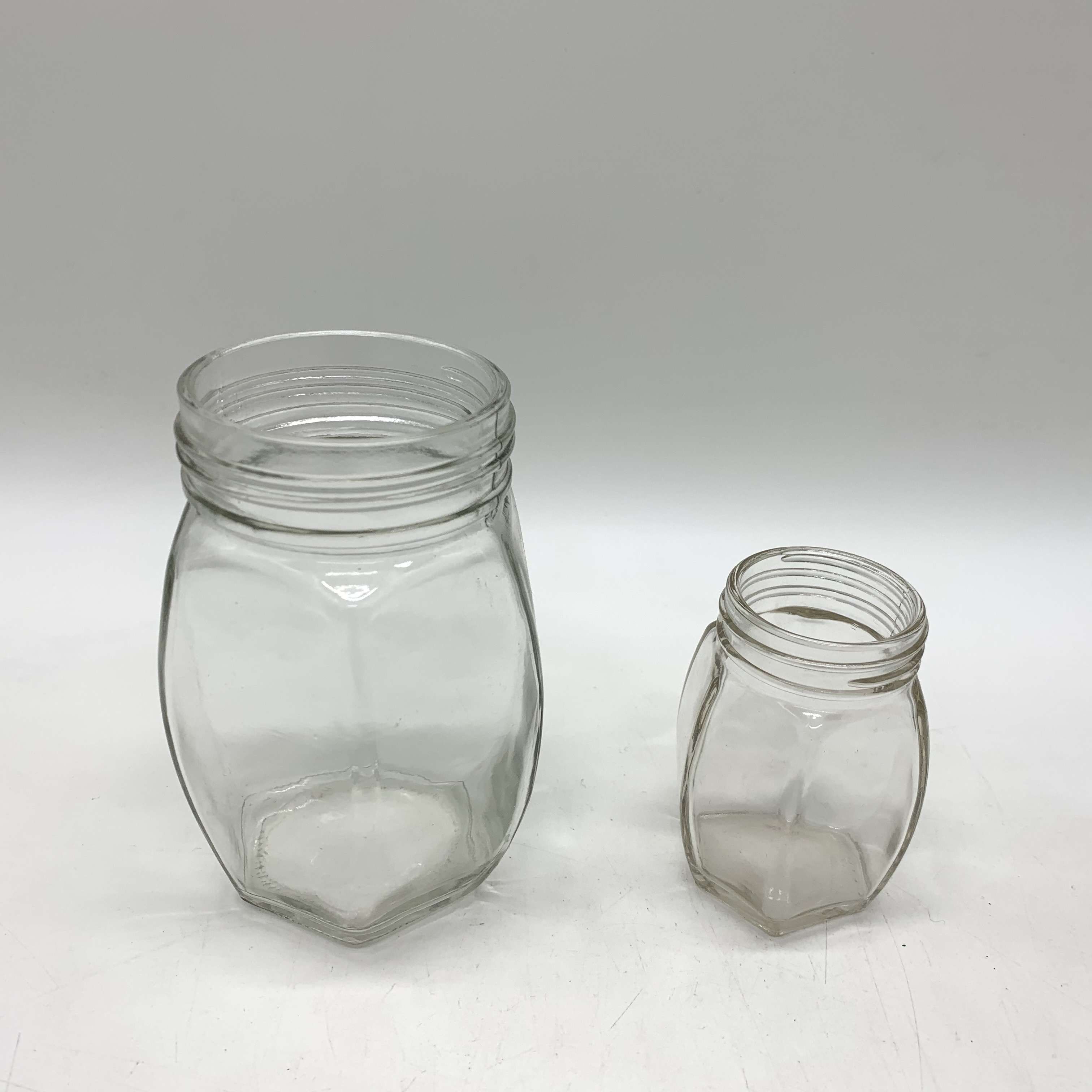 Food Grade 350ml 500ml Oval Hexagon Glass Jar For Honey Jam Food