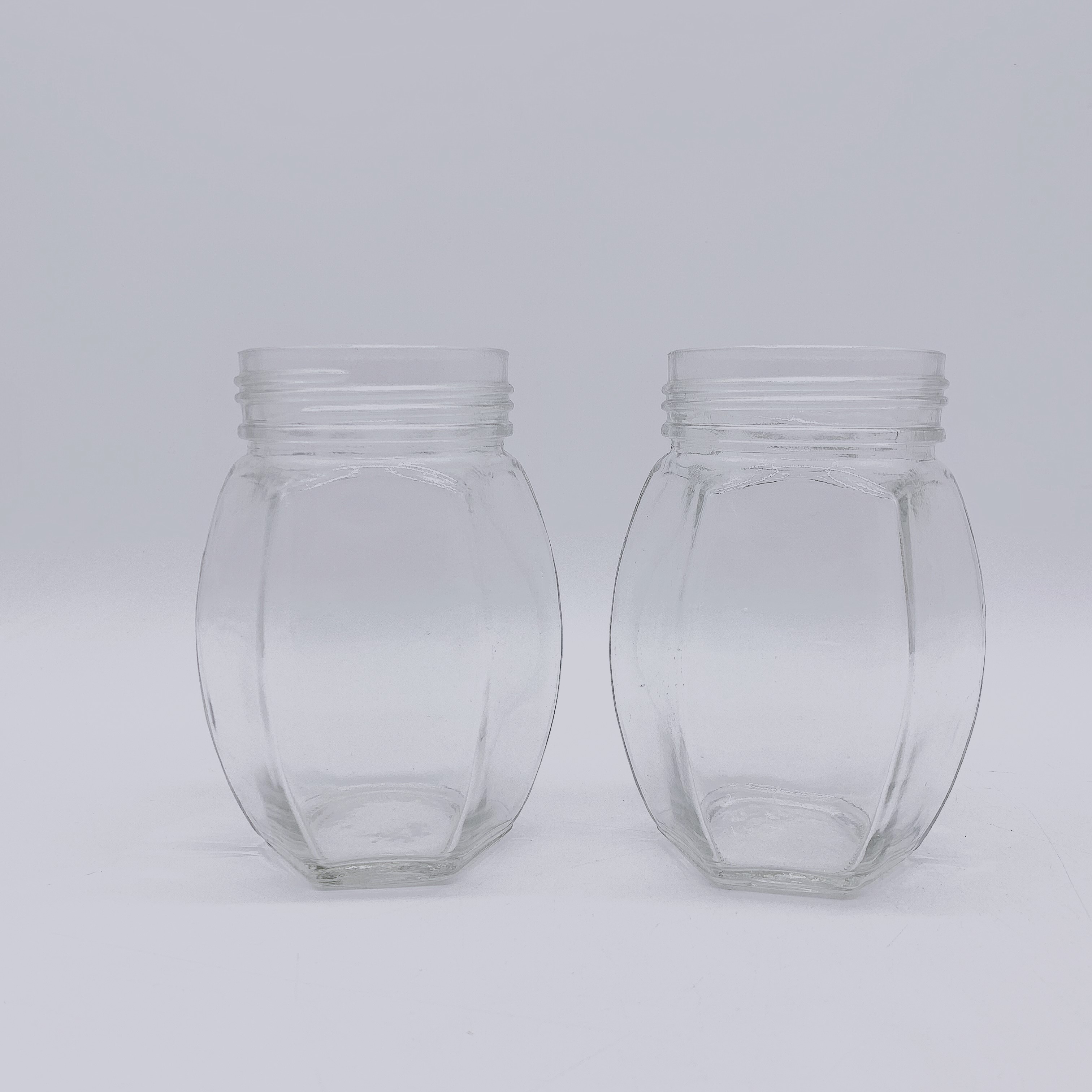 Food Grade 350ml 500ml Oval Hexagon Glass Jar For Honey Jam Food