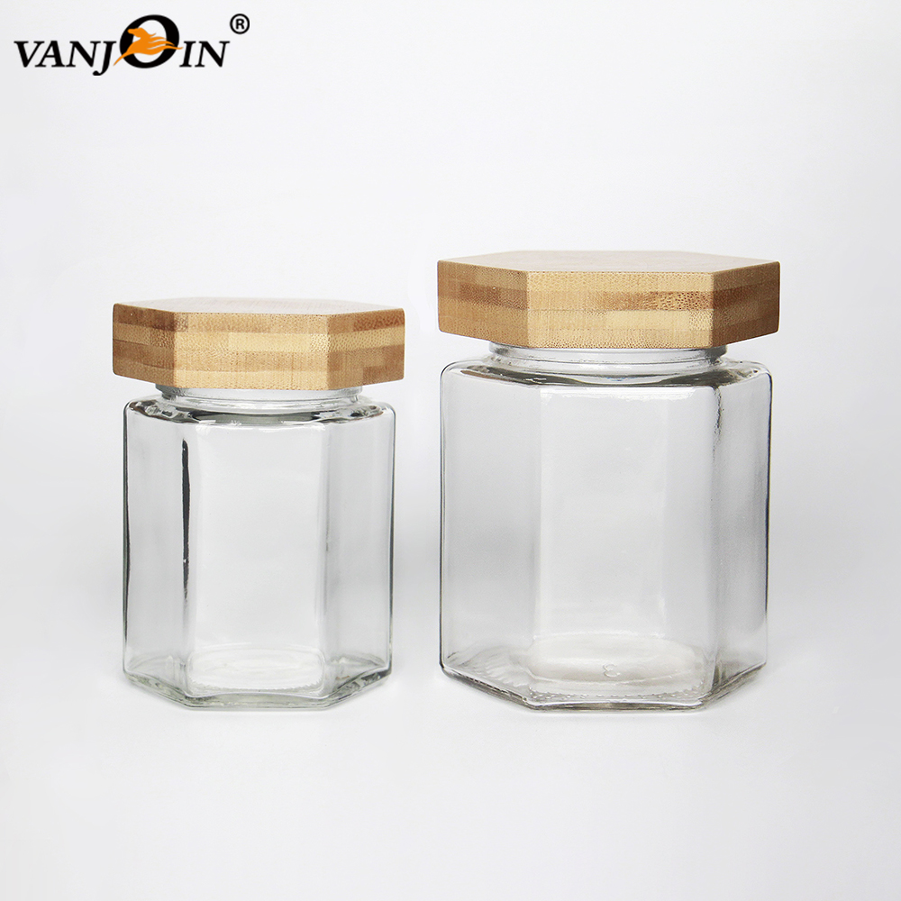 Food Grade 4oz 6oz Clear Glass Food Container Honey Jar With Wood Lid