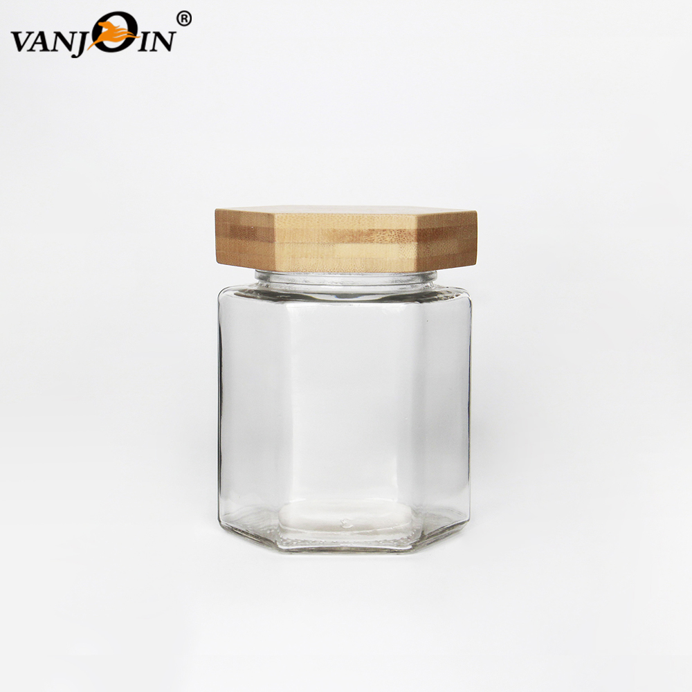 Food Grade 4oz 6oz Clear Glass Food Container Honey Jar With Wood Lid