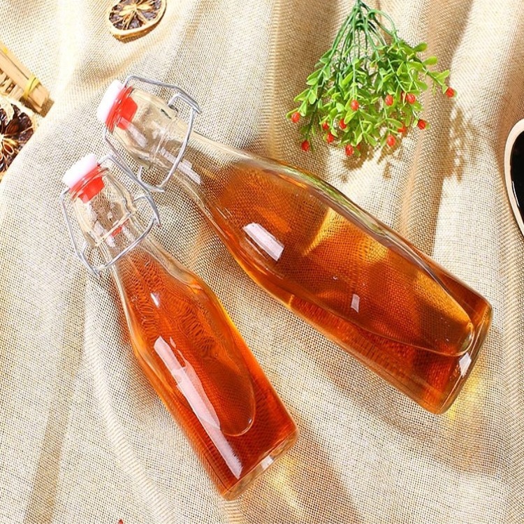 Food Grade Factory Price Swing Clip Top Clear Sealed Glass Storage Beverage Bottles