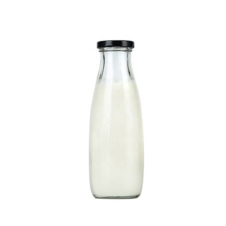 Food grade Clear 250ml round glass bottles with metal lid for cold pressed milk tea juice