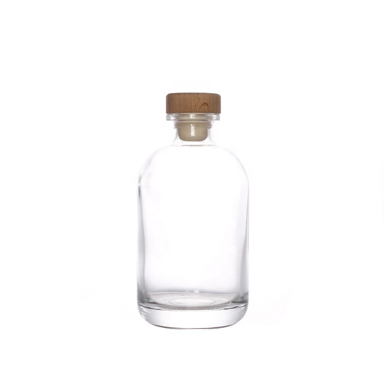 Food grade clear frosted round glass bottle with cork stopper for juice beverage liquor packaging
