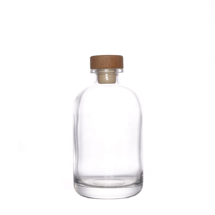 Food grade clear frosted round glass bottle with cork stopper for juice beverage liquor packaging