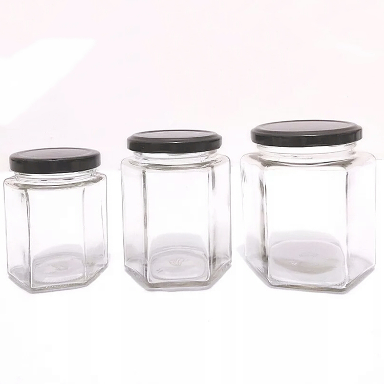 Food grade hexagonal clear 45ml to 730ml glass storage jar with metal lid for honey coffee bean grains candy