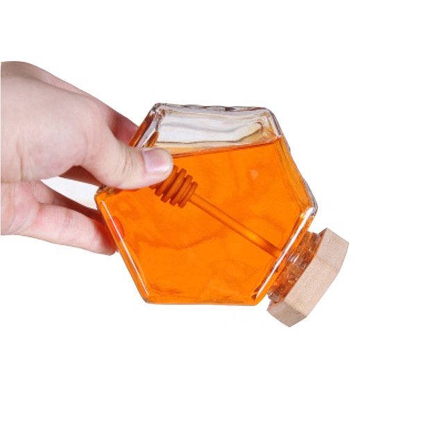 Food grade hexagonal glass jar with bamboo lid and dipper for honey