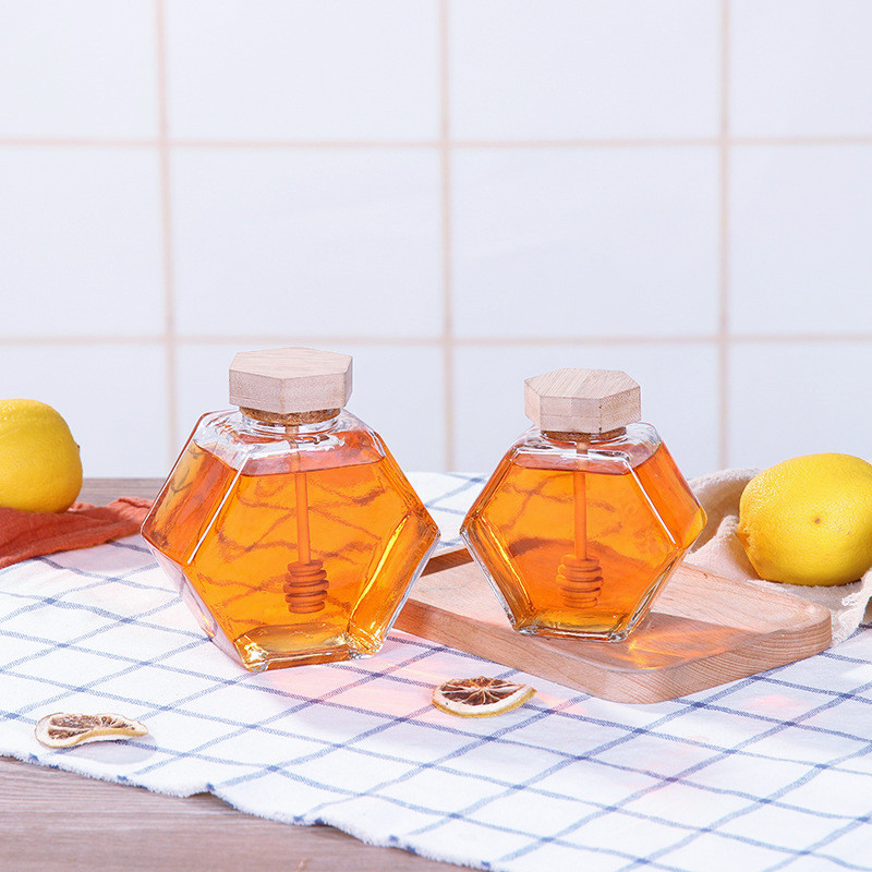 Food packaging 100ml small hexagonal glass honey jar with wooden dipper