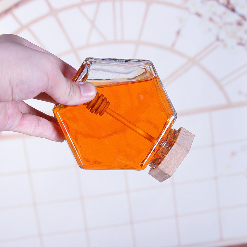 Food packaging 100ml small hexagonal glass honey jar with wooden dipper