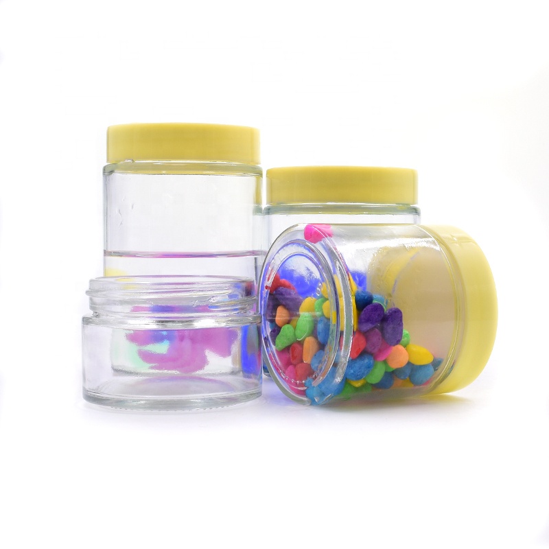 Free sample 120ml 180ml clear round flower cosmetic packaging weed jar candle jar glass jar and bottle with yellow plastic lid