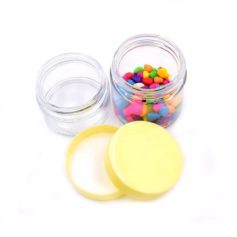 Free sample 120ml 180ml clear round flower cosmetic packaging weed jar candle jar glass jar and bottle with yellow plastic lid