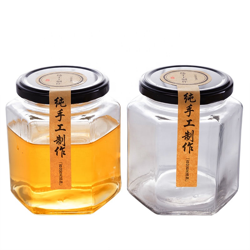 Free sample cheap hexagon honey jars, hexagon glass jar 50ml 180ml 380ml 500ml with black lids food jar