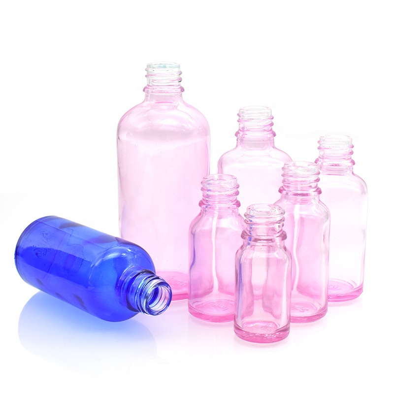 Free sample printed glass bottle pink blue black 30ml dropper glass essential oil bottle 50ml 100ml 15ml 10ml with plastic lids