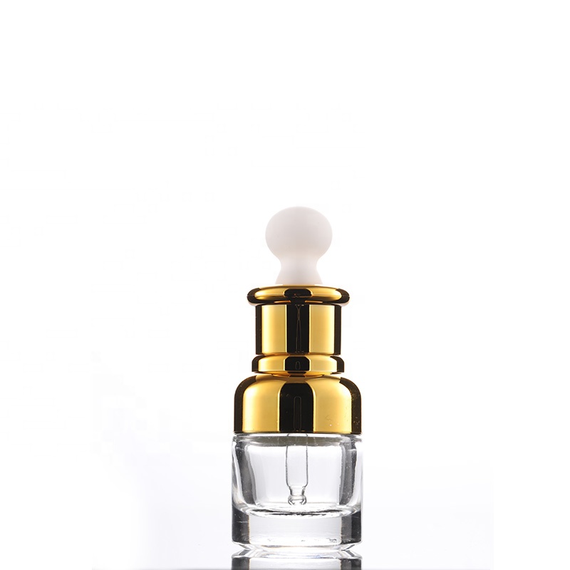 Free sample! stock gold plated shoulder glass dropper bottle 20ml 30ml for cosmetic oil e-liquid packing