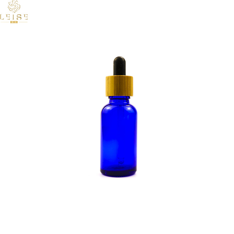 Free samples 10ml 15ml 30ml amber blue greenmatte black e liquid glass dropper bottles with bamboo screw cap
