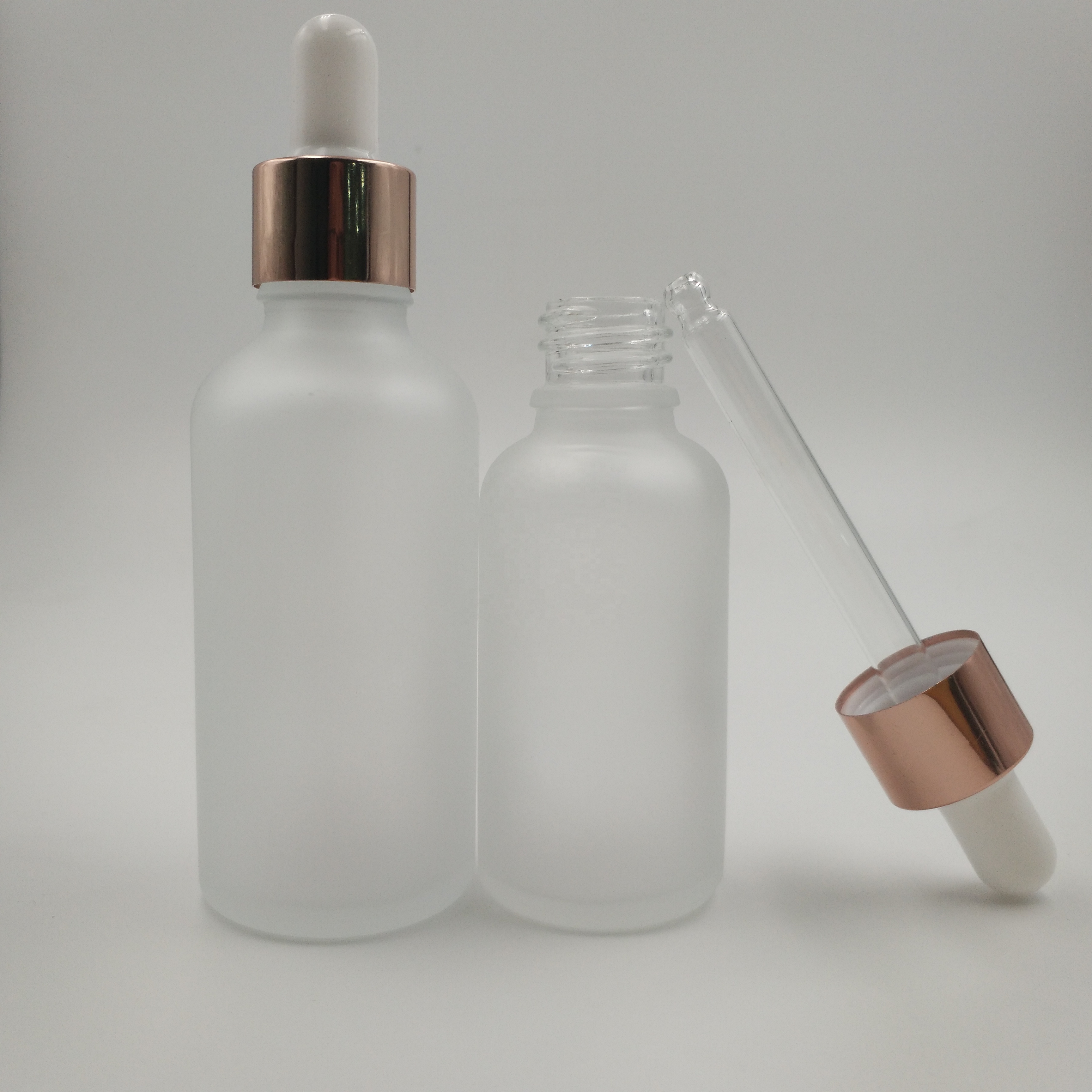 Free samples 5ml 10ml 15ml 20ml 30ml 50ml 100ml frosted clear glass essential oil dropper bottle with rose gold lid