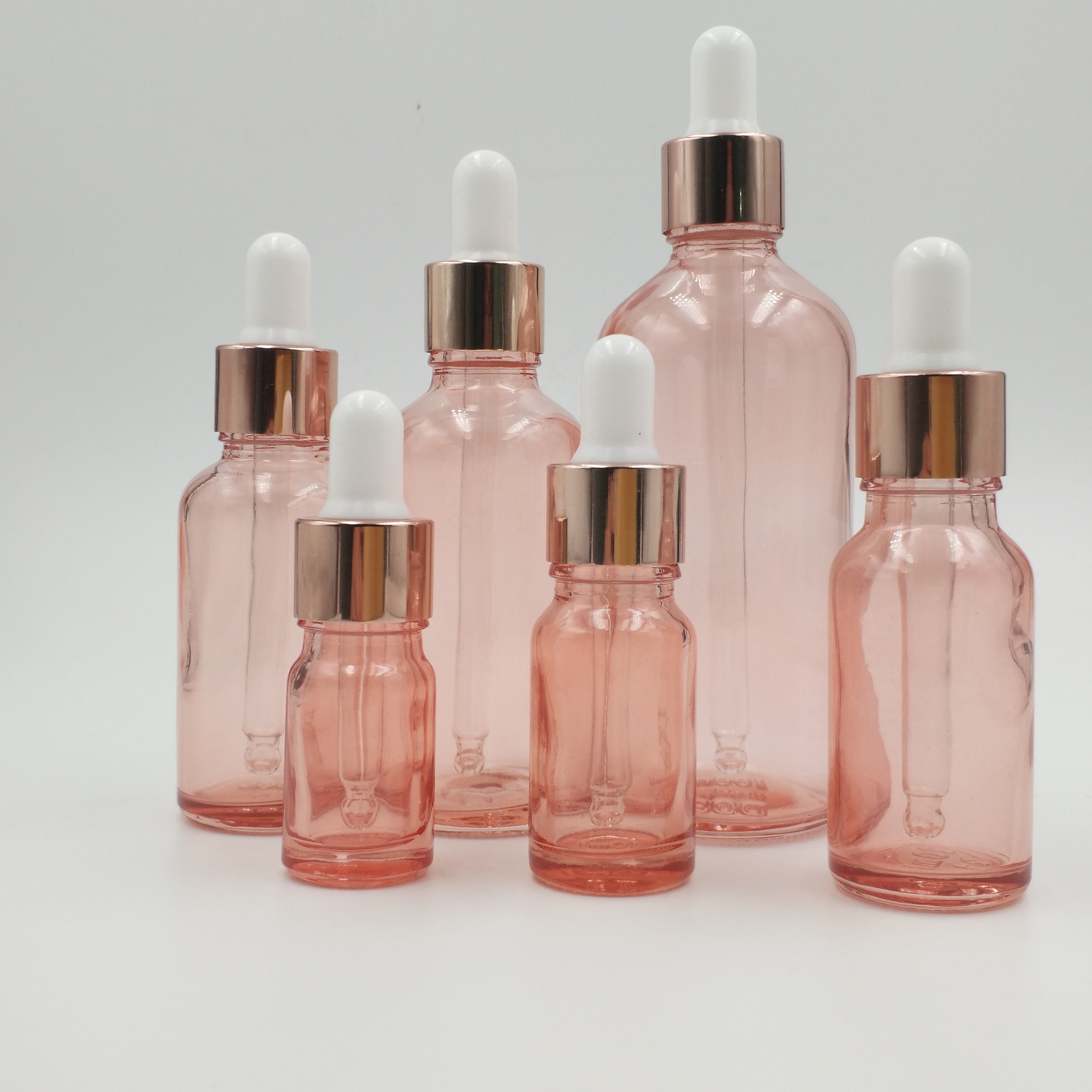 Free samples 5ml 10ml 15ml 20ml 30ml 50ml 100ml frosted clear glass essential oil dropper bottle with rose gold lid