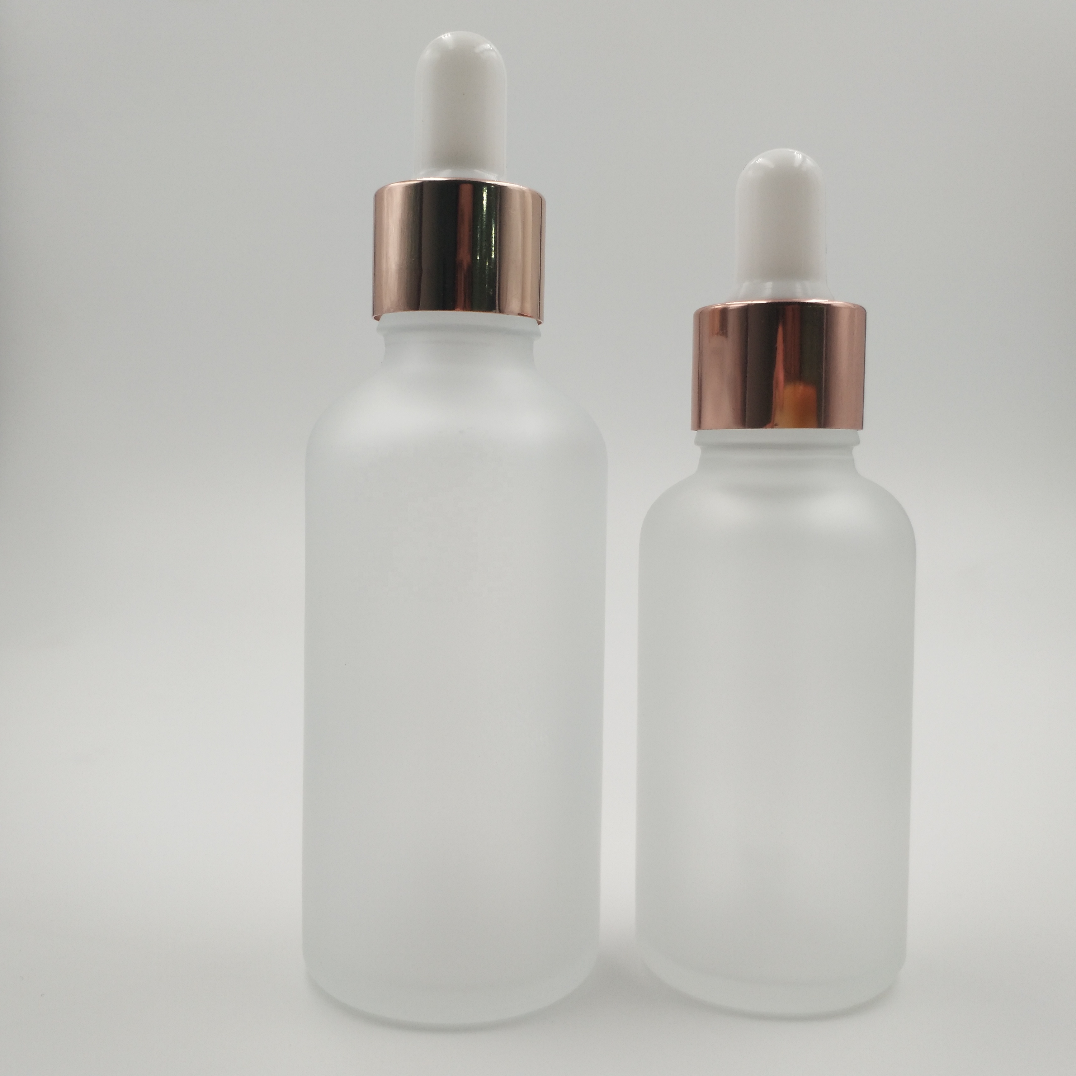 Free samples 5ml 10ml 15ml 20ml 30ml 50ml 100ml frosted clear glass essential oil dropper bottle with rose gold lid