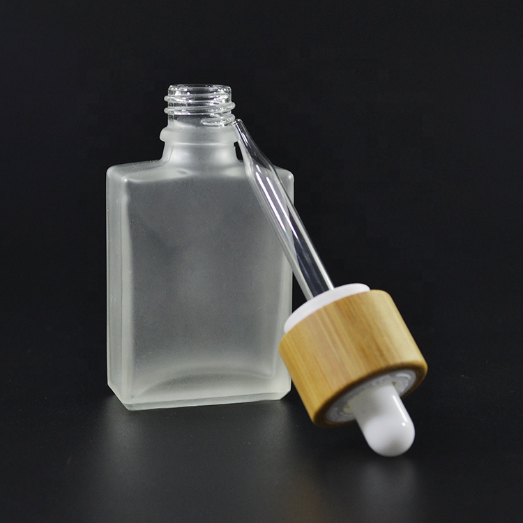 Free samples essential oil empty frosted clear bamboo lid 30ml 50ml 100ml 1oz rectangle glass bottle