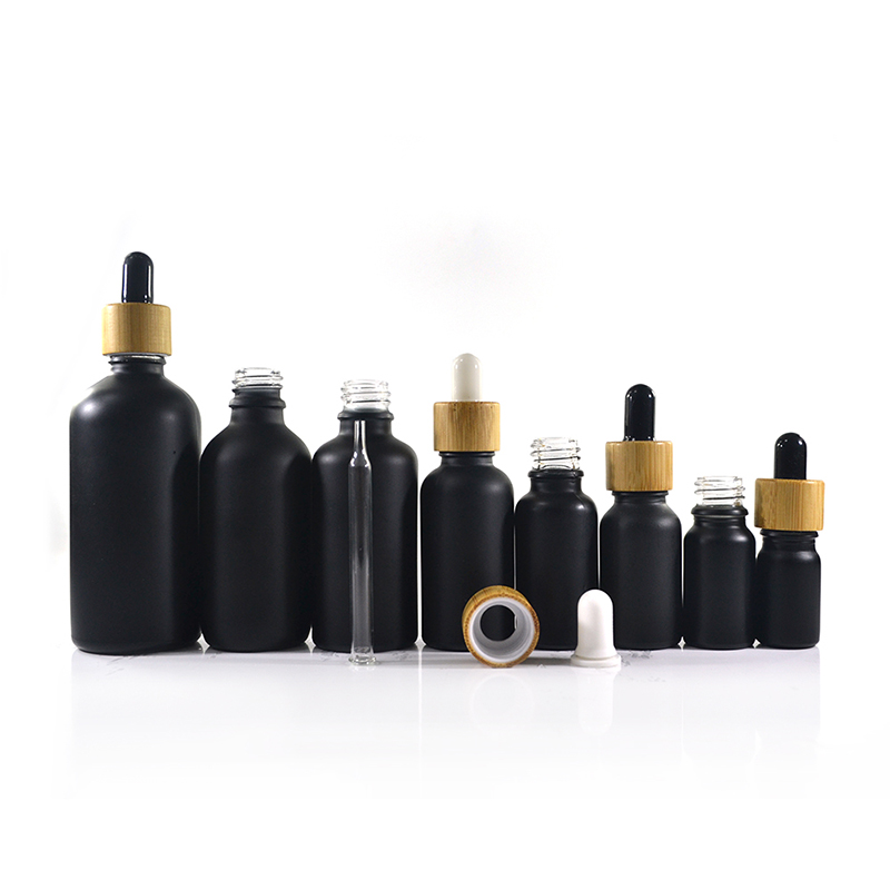 Free samples low MOQ Essential oil e liquid 30ml Luxury bamboo lid black matte glass dropper bottle