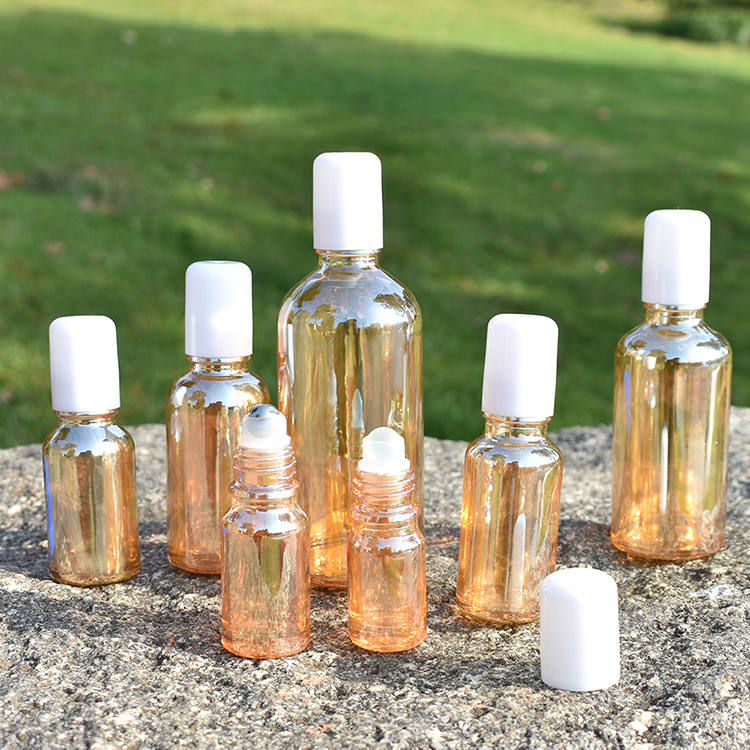 Free shipping Exquisite 10ml 20ml 30ml Amber Golden Glass Essential Oil Roll On Bottles With White Plastic Cap