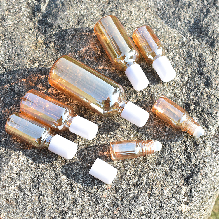 Free shipping Exquisite 10ml 20ml 30ml Amber Golden Glass Essential Oil Roll On Bottles With White Plastic Cap