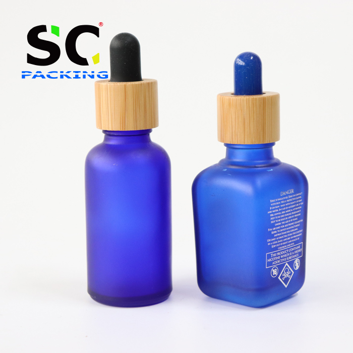 Frosted 30ml 1oz CBD oil tincture bottles glass dropper serum bottle with black tube box paper packaging