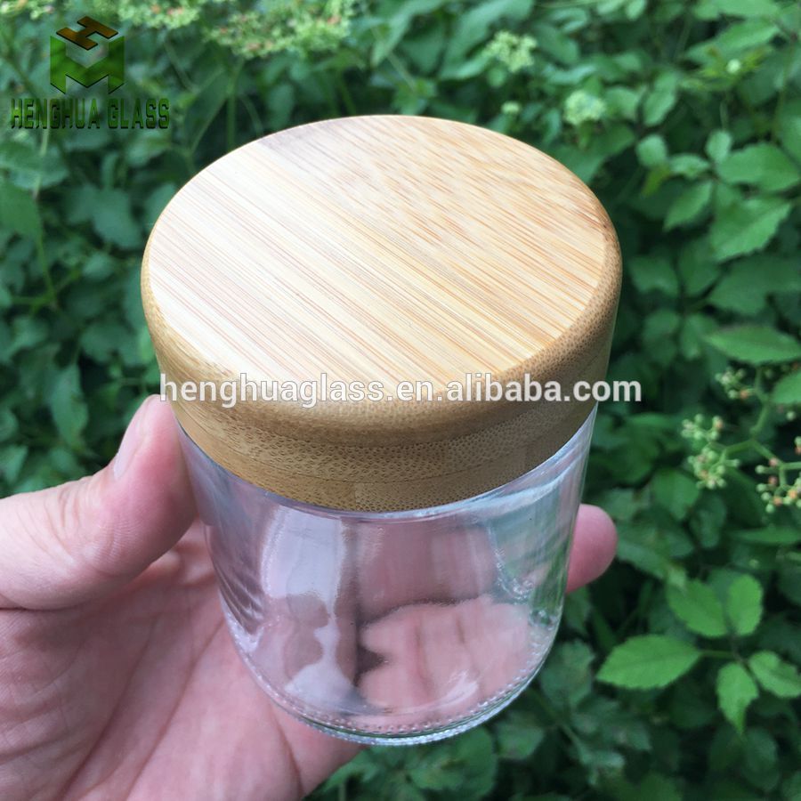 Frosted 8oz Glass jar with bamboo wood Child proof lid wholesale