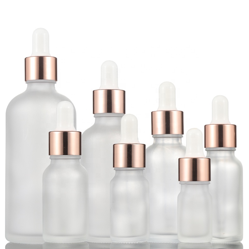 Frosted Clear Essential Oil 30ml 50ml 100ml Glass Bottle with Rose Gold Aluminum Cap