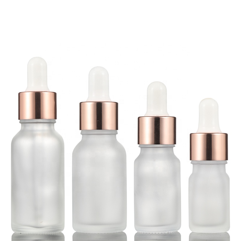 Frosted Clear Essential Oil 30ml 50ml 100ml Glass Bottle with Rose Gold Aluminum Cap