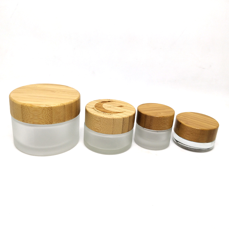 Frosted glass cosmetic jars 50ml bamboo lid glass jar with bamboo lid customized color glass jar silk screen hot stamping