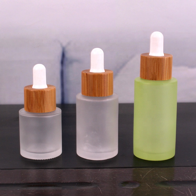 Frosted logo printing 30ml glass dropper bottle for cosmetic oil with bamboo lid