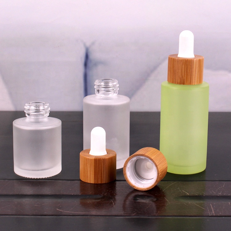 Frosted logo printing 30ml glass dropper bottle for cosmetic oil with bamboo lid