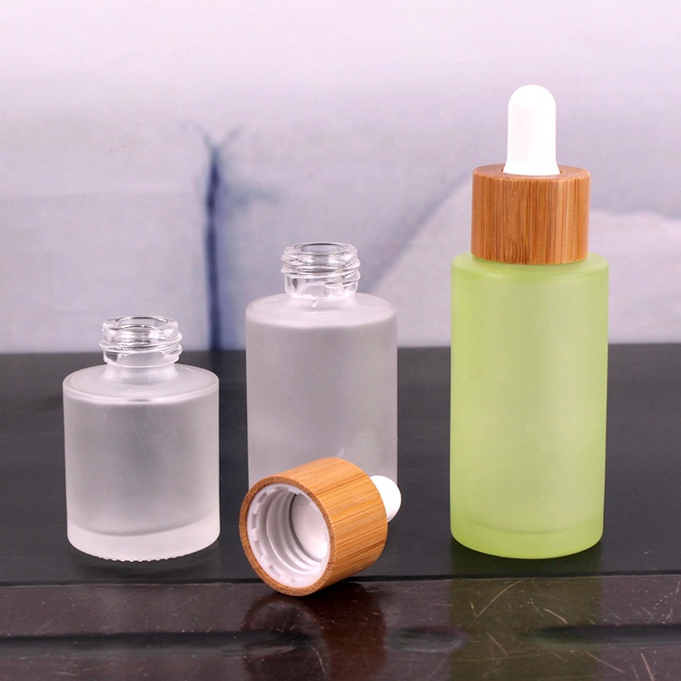 Frosted logo printing 30ml glass dropper bottle for cosmetic oil with bamboo lid